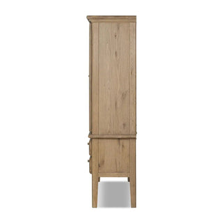 Side profile of a worn oak cabinet with a timeless design and sturdy construction.